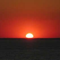Sun set over see